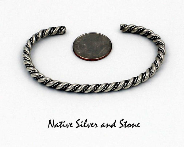 Z Franklin & Verna Tahe (Navajo)<br>Bracelet Cuff - 3/16" Diameter<br>Sterling Silver<br>Round Stock with Double Twist<br>Size: 6" Small-Medium