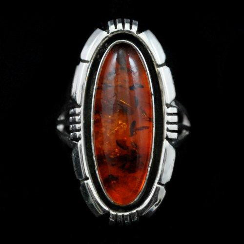Miscellaneous Artist<br>A Smith<br>Native American Crafted Jewelry<br>Ring R30 - Amber - Long Oval<br>with Saw Cut Perimeter Designs<br> Various Sizes