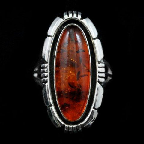 Miscellaneous Artist<br>A Smith<br>Native American Crafted Jewelry<br>Ring R30 - Amber - Long Oval<br>with Saw Cut Perimeter Designs<br> Various Sizes