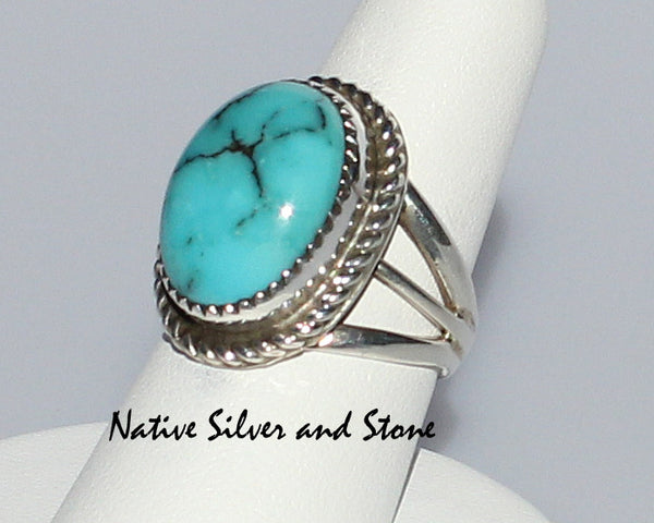 Z Gene & Martha Jackson<br>Both Deceased<br>Navajo<br>7/8" Ring<br>Natural Oval Turquoise<br>Sterling Silver<br>Size 7