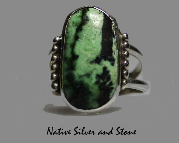 Z Gene & Martha Jackson<br>Both Deceased<br>Navajo<br>Green Garnet - Transvaal Jade<br>Vertical Rectangle<br>Sterling Silver<br>Size 5