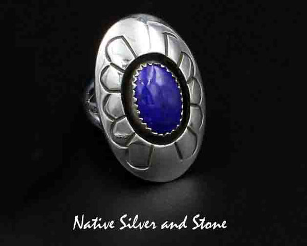 Z Gene & Martha Jackson<br>Both Deceased<br>Navajo<br>1-1/4" Ring - Lapis Oval in Shadowbox<br>Large Convex Stamped Silver Oval<br>Size 7