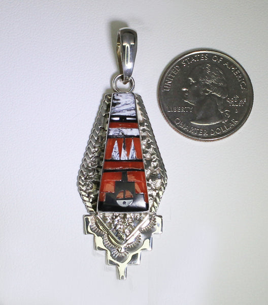 Z Rayland & Patty Edaakie (Zuni)<br>(RP Edaakie)<br>Pendant with Muti-Inlay<br>Coral, White Buffalo, Jet.<br>& White Mother of Pearl<br>Long Inlay Triangle with<br>Stamped Sterling Silver Perimeter<br>White Buffalo, Coral, Jet, White Mother of Pearl