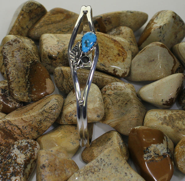 Miscellaneous Artist, Navajo<br>Bracelet Cuff<br>Small Teardrop Nugget of Turquoise<br>Leaf, Curl, and Dots Accents<br>Tapered 1/2" to 3/16"<br>Two Thin Rails of Silver<br>Size 6 (Medium-Small)