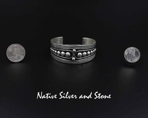 Jonathan Nez - Navajo<br>1-1/8" Bracelet (Cuff)<br>Graduated Dots, Beads and Swirl<br>Handmade Oxidized Sterling Silver<br>Size 6-3/8
