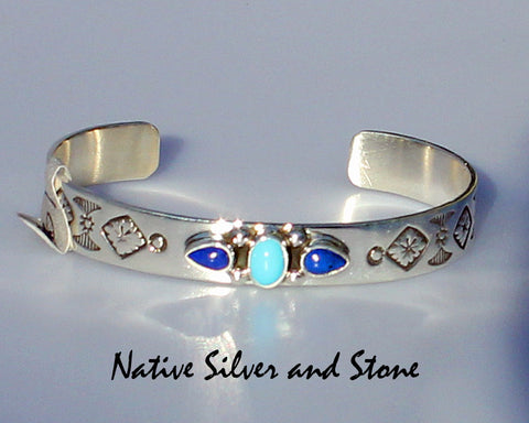 Z Miscellaneous Artist "L" - Navajo<br>Bracelet Cuff 3/8"<br>Stamped Silver<br>Oval of Turquoise<br>Horizontal Teardrops of Lapis<br>Size 6-1/2 (Medium)
