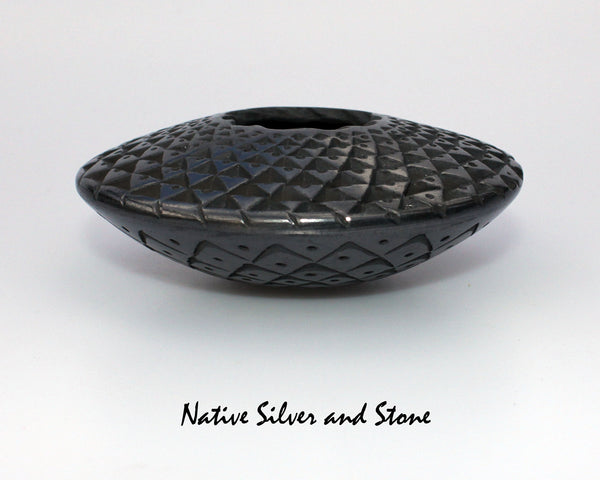 Z Lucia Quezada <br>Mata Ortiz/Nuevo Casa Grandes<br>Pottery - Handmade<br>"Flying Saucer" - Small Size<br>Sawblade Cut<br>Black Graphite <br>1-1/2"H x 3-3/4" Diameter