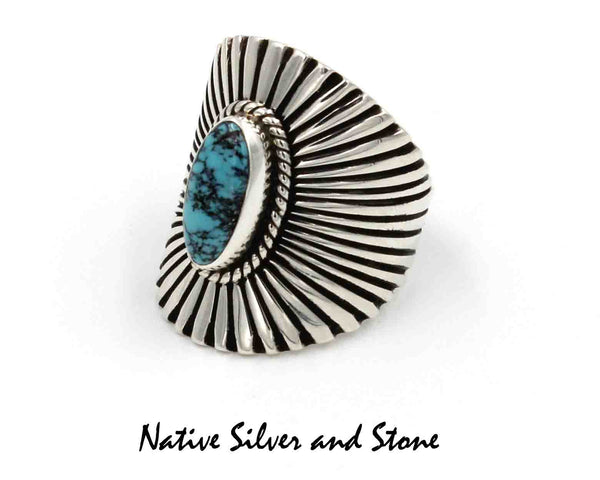 Lyle Piaso - Navajo<br>1-3/16" Ring<br>Sterling Silver "Shield"/"Sunburst"<br>Turquoise w Matrix Oval Cabachon<br>Size 11