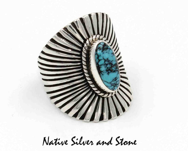 Lyle Piaso - Navajo<br>1-3/16" Ring<br>Sterling Silver "Shield"/"Sunburst"<br>Turquoise w Matrix Oval Cabachon<br>Size 11