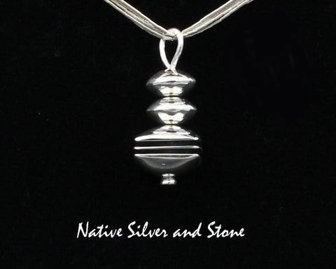 Z Mary Tom - Navajo<br>1-1/16" Pendant<br>9/16" Square Disc Bead<br>Sterling Silver