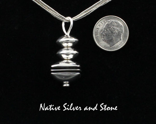 Z Mary Tom - Navajo<br>1-1/16" Pendant<br>9/16" Square Disc Bead<br>Sterling Silver