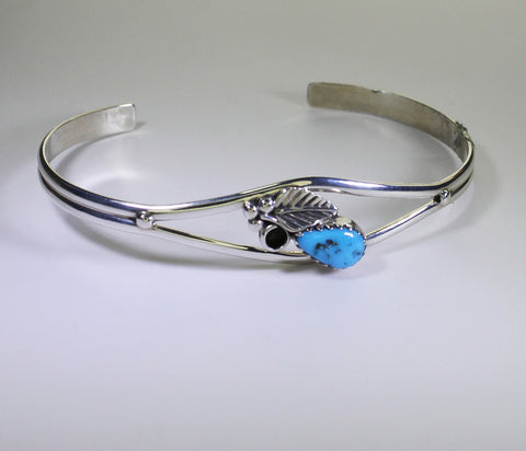 Miscellaneous Artist, Navajo<br>Bracelet Cuff<br>Small Teardrop Nugget of Turquoise<br>Leaf, Curl, and Dots Accents<br>Tapered 1/2" to 3/16"<br>Two Thin Rails of Silver<br>Size 6 (Medium-Small)