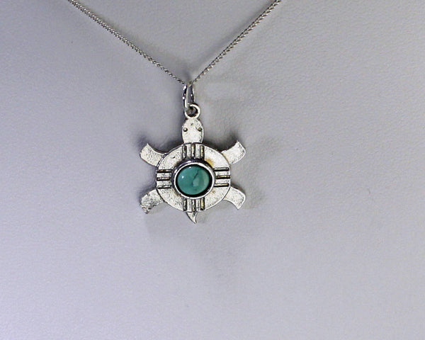 Z Bennard & Frances Dallasvuyaoma Hopi/Pima<br>13/16"  Pendant<br>Turtle<br>Bennard & Frances Dallasvuyaoma<br>Hopi/Pima<br> Two-Sided Silver w Turquoise Dot<br>18" Silver Box Chain<br>Sterling Silver