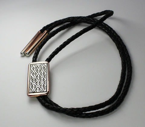 Z Randy Secatero & Sylvana Apache<br>Navajo - Bola/Bolo<br>Small - Diamonds & Dot Designs<br>Copper with Oxidized Silver Overlay and Stamping<br>Heavy Leather Braiding
