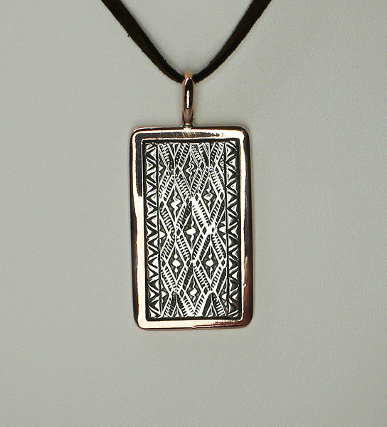 Z Randy Secatero & Sylvana Apache -Navajo<br>PDCS<br> Pendant - Large Vertical Rectangle<br><br>Copper with Sterling Silver Overlay and Vertical Diamond Stamping<br>Adjusable Leather Chain