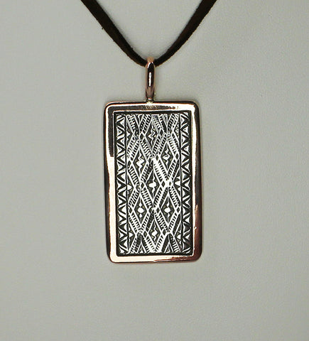 Z Randy Secatero & Sylvana Apache -Navajo<br>PDCS<br> Pendant - Large Vertical Rectangle<br><br>Copper with Sterling Silver Overlay and Vertical Diamond Stamping<br>Adjusable Leather Chain