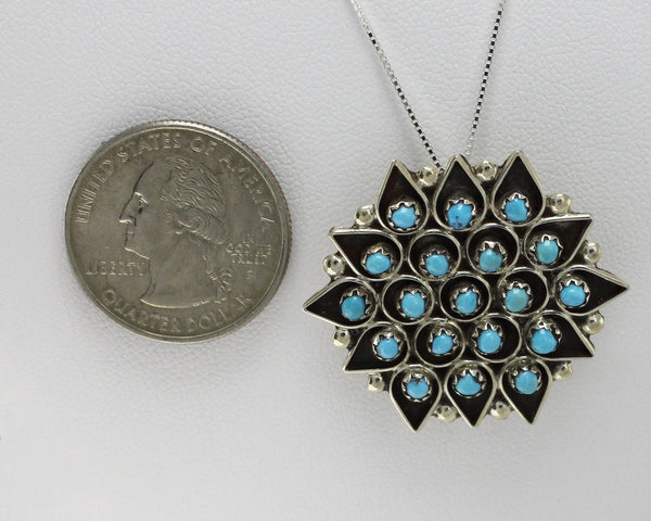 ZSLD Florenda Lonasee (Zuni)<br>Pendant/Pin - Flower<br>Snake Eye Sleeping Beauty Turquoise<br>Set in Sterling Silver