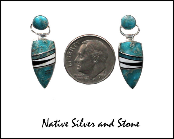 Nataanii, (John Charley) - Navajo<br>1" Earrings - Dangle Post Multi-Inlay <br>Spear with Circle on Swivel Top<br>Long Feathercut<br>Kingman Turquoise, Onyx,<br>& Magnesite<br>Sterling Silver