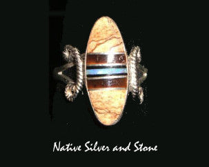 Nataanii  (John Charley) - Navajo<br>Ring<br>Multi-Inlay Short Oval<br>Picture Jasper, Tiger Eye, Onyx, Opal<br>Size 8-1/4