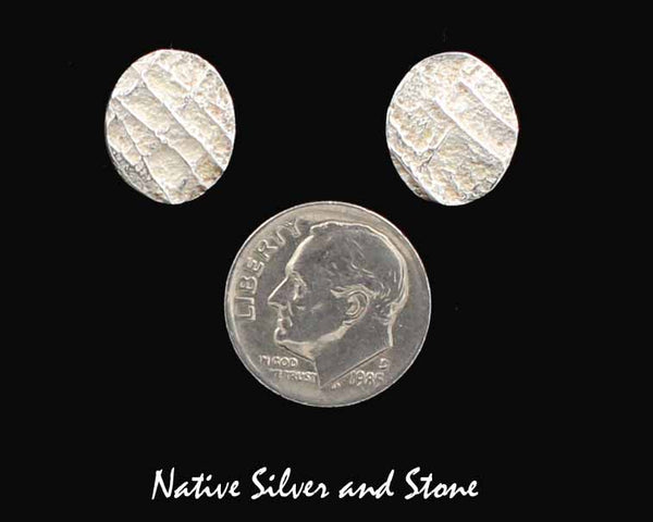 Z Peter Nelson - Navajo<br>9/16" Earrings - "Ovals"<br>Polished Tufa Cast<br>"Waffle" Pattern<br>Post <br>Sterling Silver