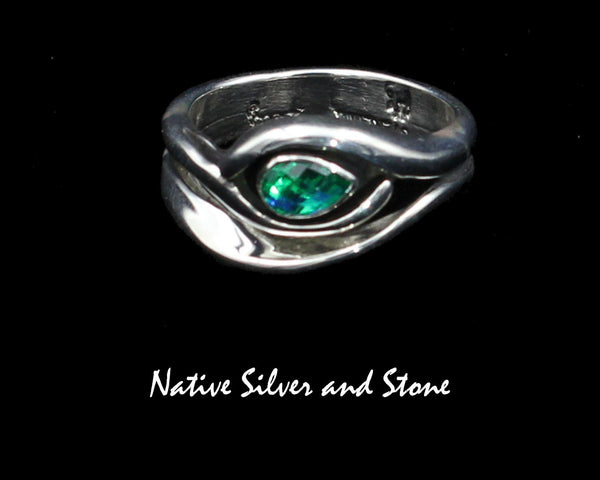 Raymond Coriz - Kewa<br>7/16" Ring<br>Rainbow Peridot<br>"Egyptian" Eye<br>Size 8