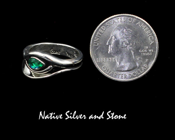 Raymond Coriz - Kewa<br>7/16" Ring<br>Rainbow Peridot<br>"Egyptian" Eye<br>Size 8