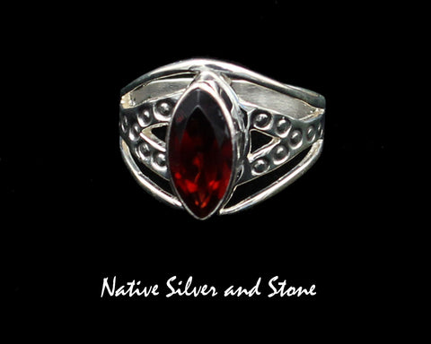 Raymond Coriz - Kewa<br>5/8" Ring<br>Garnet Red - Faceted<br>Sharp Oval "Marquis"<br>Size 7