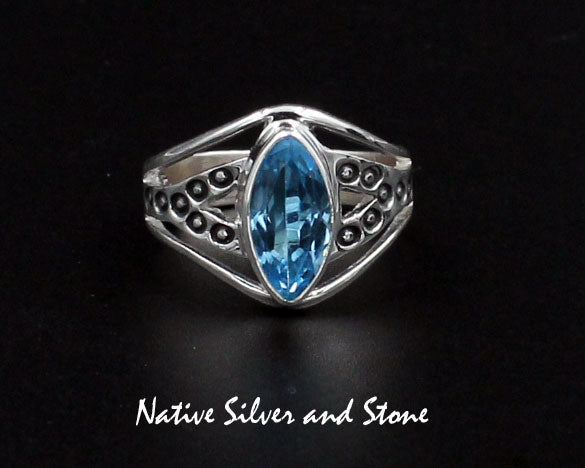 Raymond Coriz - Kewa<br>5/8" Ring<br>Topaz - Blue Faceted<br>Sharp Oval "Marquis"<br>Size 7