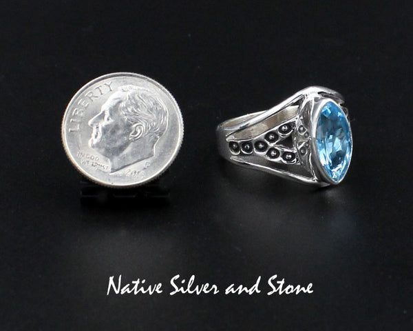 Raymond Coriz - Kewa<br>5/8" Ring<br>Topaz - Blue Faceted<br>Sharp Oval "Marquis"<br>Size 7