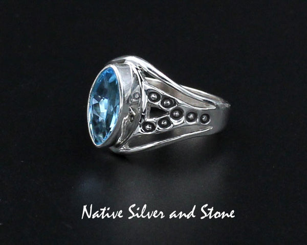 Raymond Coriz - Kewa<br>5/8" Ring<br>Topaz - Blue Faceted<br>Sharp Oval "Marquis"<br>Size 7