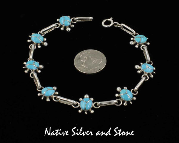 Z Rebecca Yatsattie - Zuni<br>Bracelet - Link - Turtles<br>Sleeping Beauty Turquoise