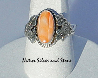Ruth Ann Begay<br>Navajo<br>Ring - Orange Spiny Oval in<br>Flowered Sterling Setting<br>Size 9