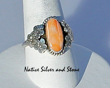 Ruth Ann Begay<br>Navajo<br>Ring - Orange Spiny Oval in<br>Flowered Sterling Setting<br>Size 9
