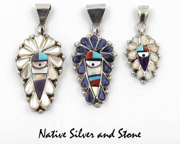 Z Stanford Gchachu & Geraldine Gchachu<br>Zuni Pendant<br>1 Medium-Large<br>Sun Face Multi-Inlay<br>White Mother of Pearl, Sodalite, Turquoise,  Jet, and<br>Opal