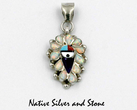 Z Stanford Gchachu<br>Zuni Pendant<br>3 Small<br>Sun Face Multi-Inlay<br>Opal, White Mother of Pearl, Turquoise,  Jet, and<br>Purple & Orange Spiny