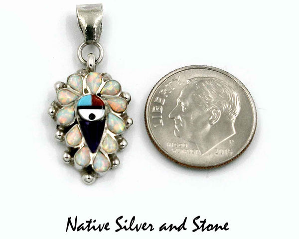 Z Stanford Gchachu<br>Zuni Pendant<br>3 Small<br>Sun Face Multi-Inlay<br>Opal, White Mother of Pearl, Turquoise,  Jet, and<br>Purple & Orange Spiny