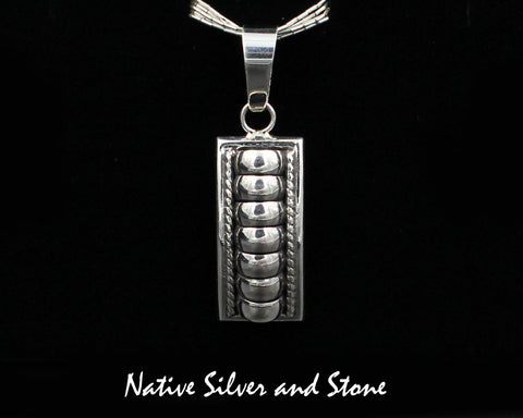 Z Thomas Charley/Thomas Charlie<br>Navajo<br>1-1/4" Pendant - Rectangle<br>"Melon - "Segmented<br>Sterling Silver
