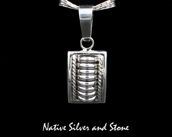 Z Thomas Charley/Thomas Charlie<br>Navajo<br>15/16" Pendant - Rectangle<br>"Melon - "Segmented<br>Sterling Silver