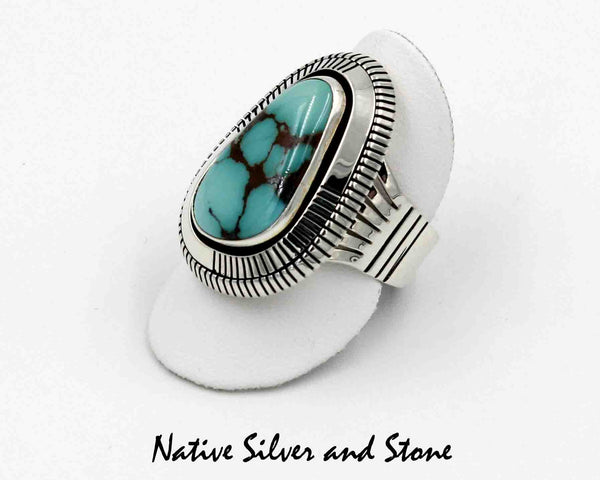 Z Tim Bedah (Deceased) - Navajo<br>1-1/4" Ring<br>Turquoise - Freeform Triangle<br>Heavy Saw Cut Perimeter<br>Sterling Silver<br>Size 10-3/4