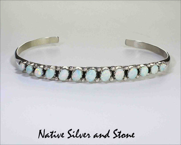 Z Carmichael Walela (Zuni) Jewelry<br>Bracelet Cuff 1/4" Tapered to 1/8"<br>Opal Ovals Angled with<br>Sterling Silver Bead Accents<br>Size 7 (Large)